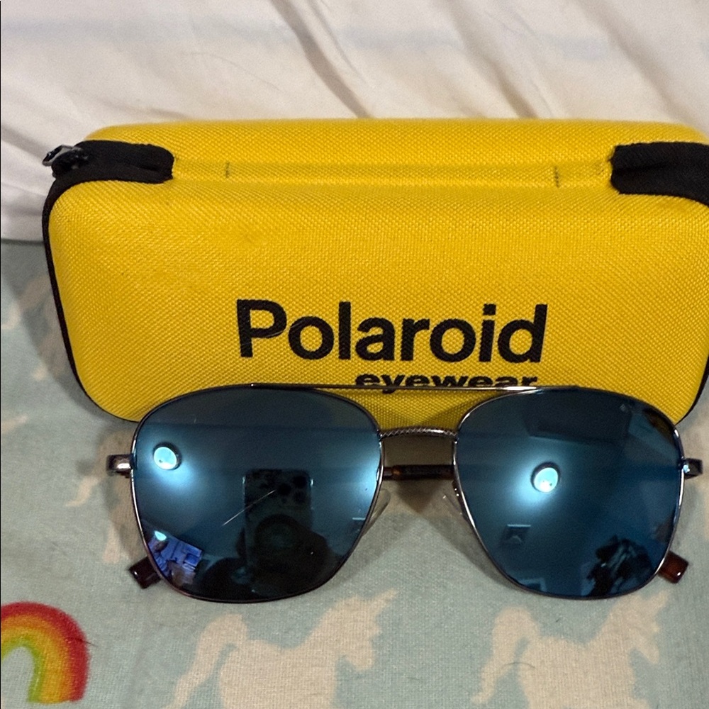 Polaroid Eyewear with Blue Lenses and Yellow Case